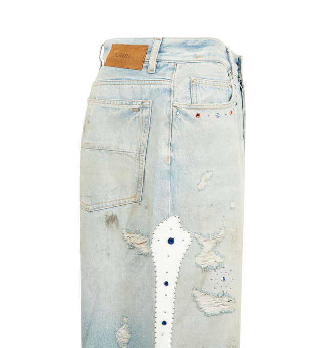 Image 3 of 4 - BLUE - AMIRI Bones Studded Baggy Jean featuring croc embossed leather bone appliques and stud detailing, distressed throughout, stud embellishments, rhinestone rivets and baggy fit. 100% cotton. Made in Italy.