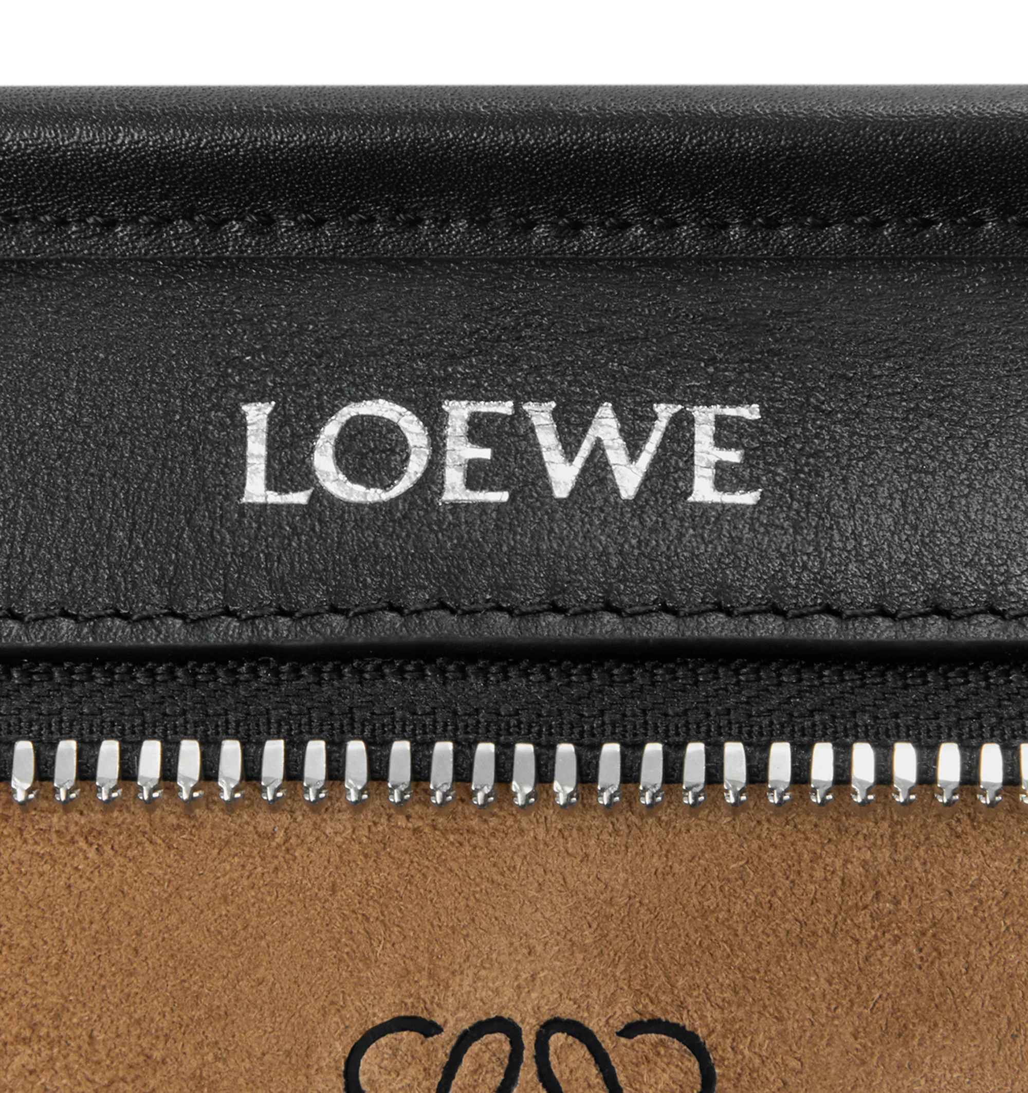 Image 9 of 11 - BLACK - Loewe Mini Amazona 180 Bag in leather features a relaxed silhouette anchored by a single toron top handle, designed to be carried open, while a concealed closure secures the main compartment, removable shoulder and crossbody straps, two carry options: short handle, removable and adjustable crossbody strap, zip closure with two leather zip pullers, two compartments, main compartment closed with magnetic closure, left side d-ring for customization, suede and nappa lambskin lining, and