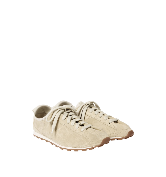 Image 2 of 4 - WHITE - JACQUEMUS Tennis Sneaker featuring soft crocodile-embossed suede, almond-shaped toe, flat laces, embossed logo on the tongue, embossed logo on the heel tab, removable leather-covered insole and rubber outsole in a round and square shape. 100% calf leather. Outsole: 100% thermoplastic polyurethane. Made in Portugal. 