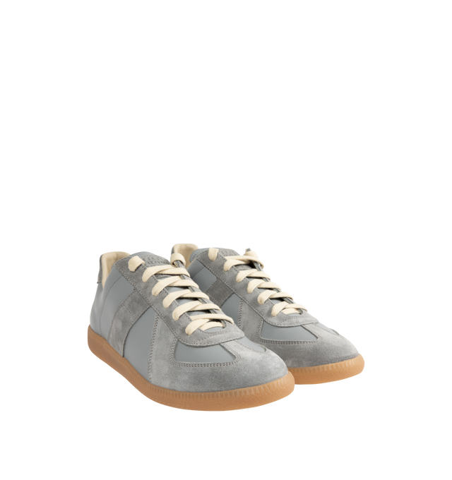 Image 2 of 5 - BLUE - MAISON MARGIELA High Quality Luxury Sneakers featuring lace-up sneakers in buffed nappa calfskin and calfskin suede, contrasting sole, Maison Margiela logo label on the tab, internal High Quality Luxury label, internal elastic and all-over Maison Margiela logo insole. 100% calf leather. Sole: 100% rubber. Made in Italy.