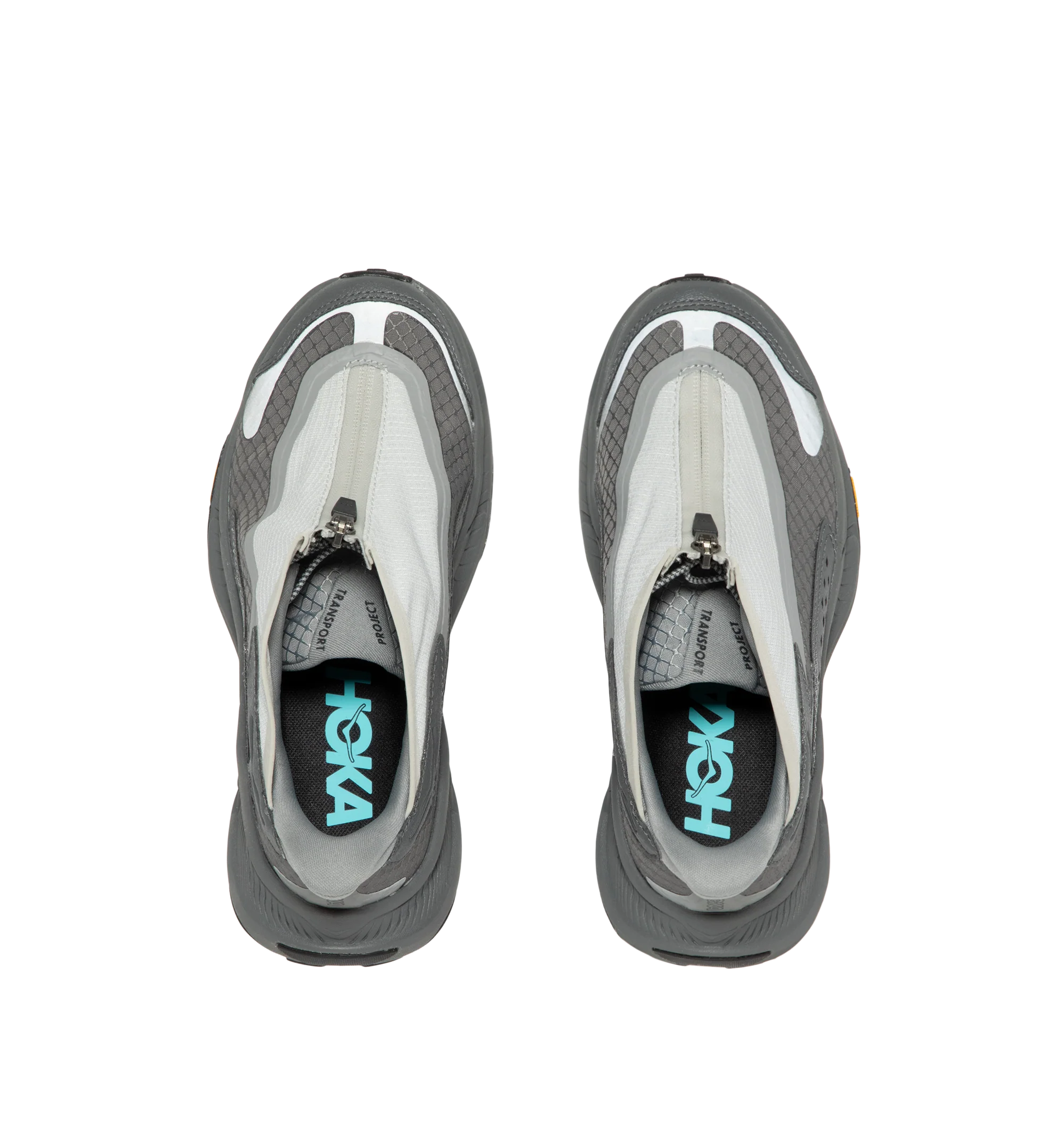 Image 5 of 5 - GREY - Hoka Project Transport Sneakers feature a shrouded ripstop upper with textured synthetic overlays for lightweight durability and a sleek, modern look. Designed for everyday wear, these performance sneakers include a quick-lace system with a zippered shroud, reflective details, signature HOKA cushioning, and a Vibram Ecostep outsole for reliable traction and lasting comfort. Main Material: Ripstop Textile and Synthetic. Sole: Vibram Rubber. Made in Vietnam. 