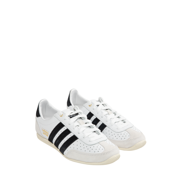 Image 2 of 5 - WHITE - Adidas Japan Sneakers are a lace-up style with leather uppers, EVA midsoles, molded heels, low-profie design, double-stitched T-toes and rubber gum soles. Reissued vitage design from a 1964 trainer that appeared in a catalog for that year's global sporting event held in Japan. Unisex style in men's sizing.