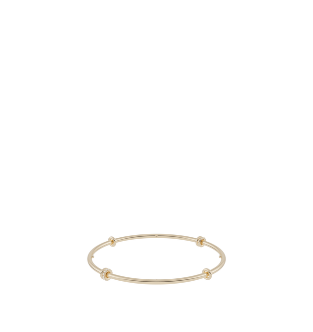 Image 1 of 1 - GOLD - SPINELLI KILCOLLIN Kini YG Pav Bangle featuring a single, full-round bangle crafted from 18k yellow gold with four quadrants of orbiting annulets in solid and pav construction. Bangle: 18k yellow gold, 2.3mm gauge, 64mm internal diameter. Annulets: 18k yellow gold, one pav. Stones: White diamonds (approx. 0.09 cttw).
