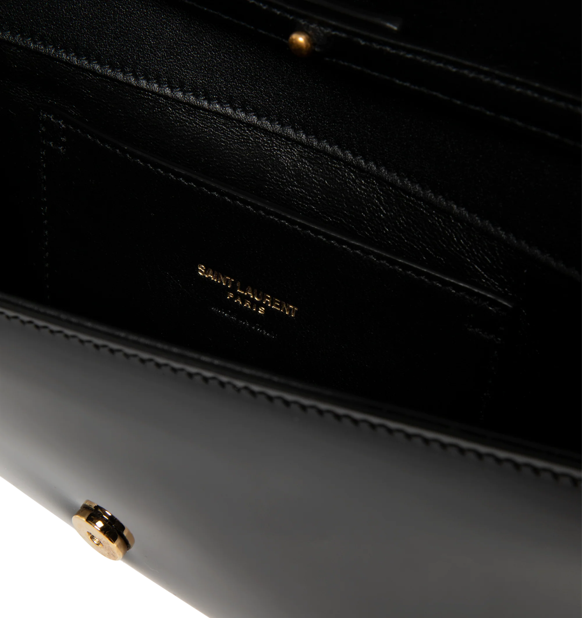Image 3 of 3 - BLACK - Saint Laurent Women's Kate Clutch is crafted from black patent calfskin leather and decorated with the Cassandre emblem. The magnetic-snap design features a removable chain strap for clutch, shoulder, or crossbody wear, a leather-lined interior, and one flat pocket. Fits a large phone, slim card case, and keys. Main Material: 90% Calfskin Leather, 10% Metal. Dimensions: 28 x 14 x 3 cm / 11 x 5.5 x 1.2 in. Strap Drop: 35 cm / 13.8 in. Made in Italy.