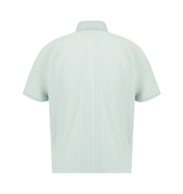 Image 2 of 2 - BROWN - Issey Miyake Men's short-sleeved polo shirt offering portability and the quick-drying properties unique to polyester. Featuring slits on both sides, collared neckline, button-front opening. 100% Polyester. Made In Japan.