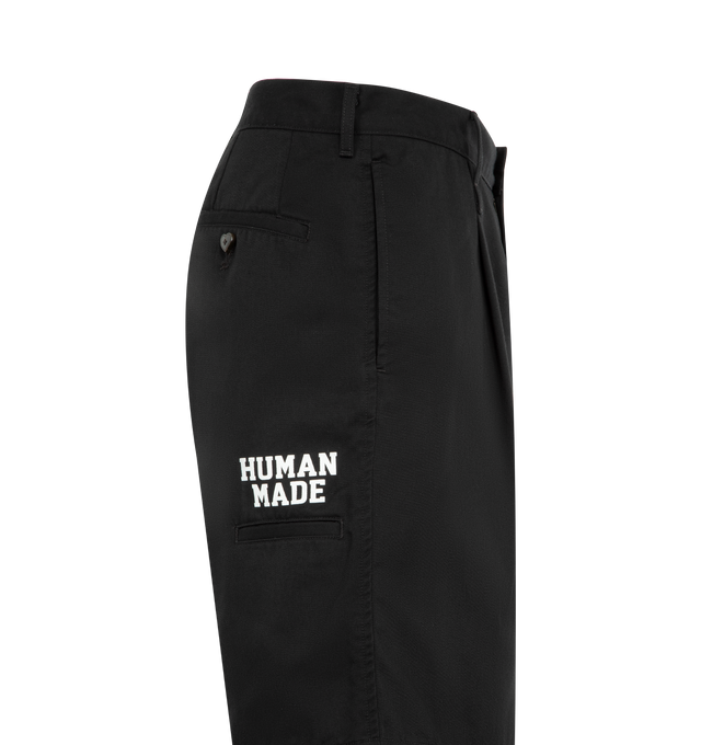 Image 3 of 3 - BLACK - HUMAN MADE Skater Shorts featuring relaxed fit, lightweight polyester-cotton twill, two tucks on the front, zip fly with branded button, total of six pockets, brand logo above the right side pocket, heart button on the right back pocket and heart patch on the front left hem. 65% polyester, 35% cotton. Made in Japan..