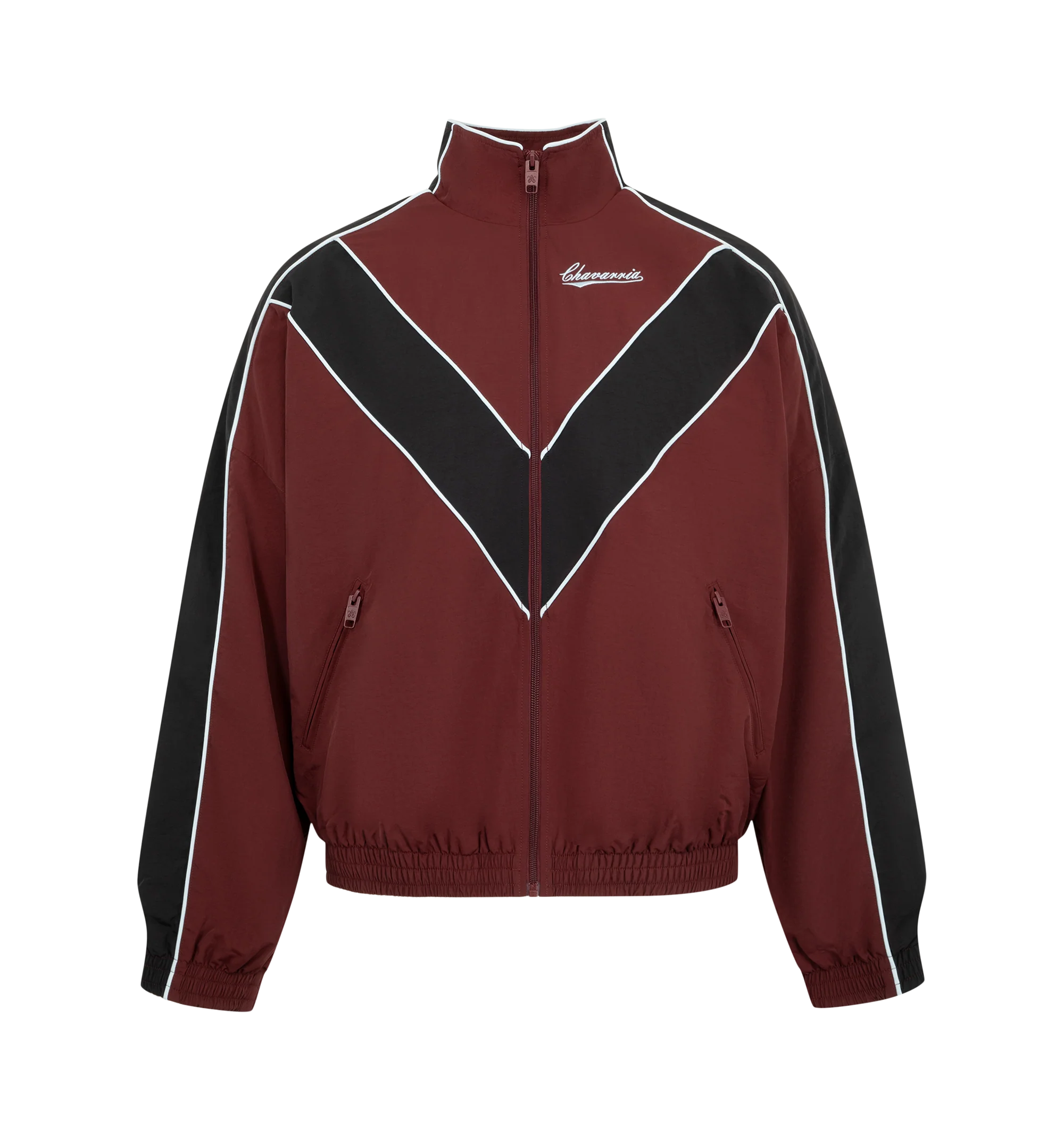 Image 1 of 3 - RED - Willy Chavarria Bad Boy Track Jacket is crafted from nylon and features a sleek, true-to-size silhouette defined by bold chevron paneling and contrast piping. Designed with a stand collar, front zip closure, two zippered pockets, stacked script logo detailing, and elasticized cuffs and hem. Main Material: 100% Nylon. Lining: Polyester.