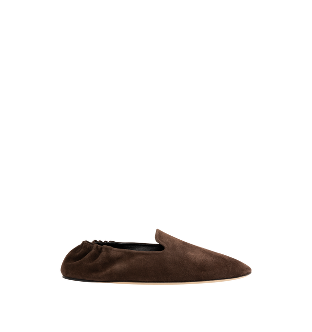 Image 1 of 4 - BROWN - THE ROW Casa Slipper featuring slip-on shoe in soft calfskin suede with round toe, elasticated heel and flexible leather sole. 100% calfskin suede. Lined in 100% lambskin leather. Calfskin leather sole. Made in Italy.