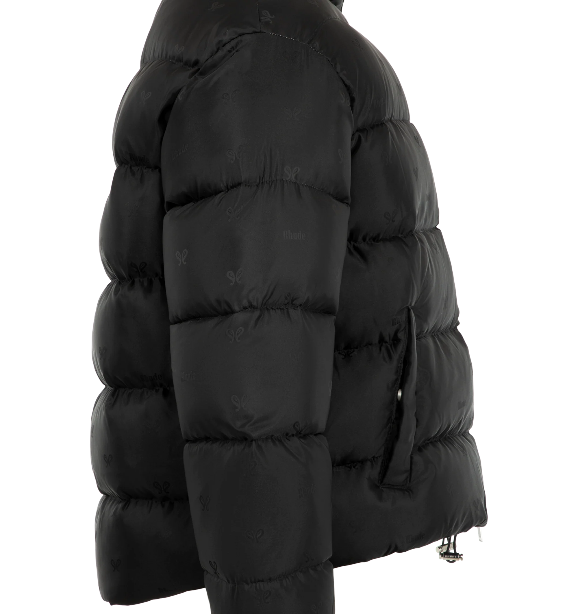 Image 3 of 3 - BLACK - Rhude Men's Paisley Jacquard Down Puffer Jacket is crafted from polyester satin with an allover paisley-inspired jacquard logo pattern and features a down-filled silhouette designed for warmth and volume. Designed with a stand collar, two-way zip closure, welt pockets, elasticized cuffs, interior zip pockets, and a bungee-style drawstring hem for adjustable comfort. Main Material: 100% Polyamide. Fill: 100% Goose Down. Lining: 100% Polyamide.