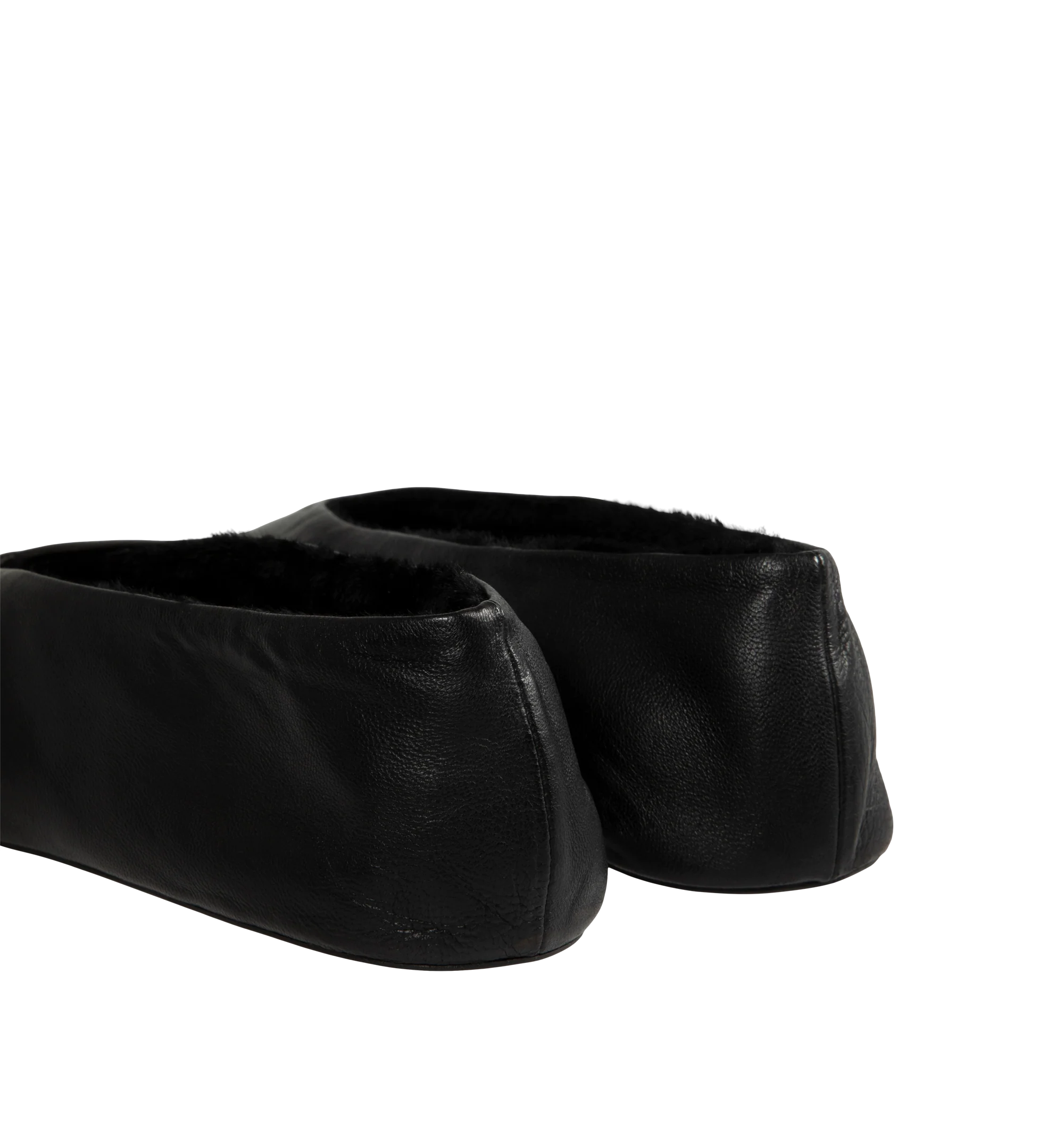 Image 3 of 4 - BLACK - The Row Women's Stella Slippers are crafted from smooth nappa lambskin leather and feature a slip-on silhouette with an oval toe, soft shearling lining, and a flexible rubber-coated sole. These designer leather slippers combine exceptional Italian craftsmanship with luxurious comfort, making them an elevated choice for effortless everyday wear. Main Material: 100% Lambskin Leather. Lining: Shearling. Sole: Rubber-Coated. Made in Italy.