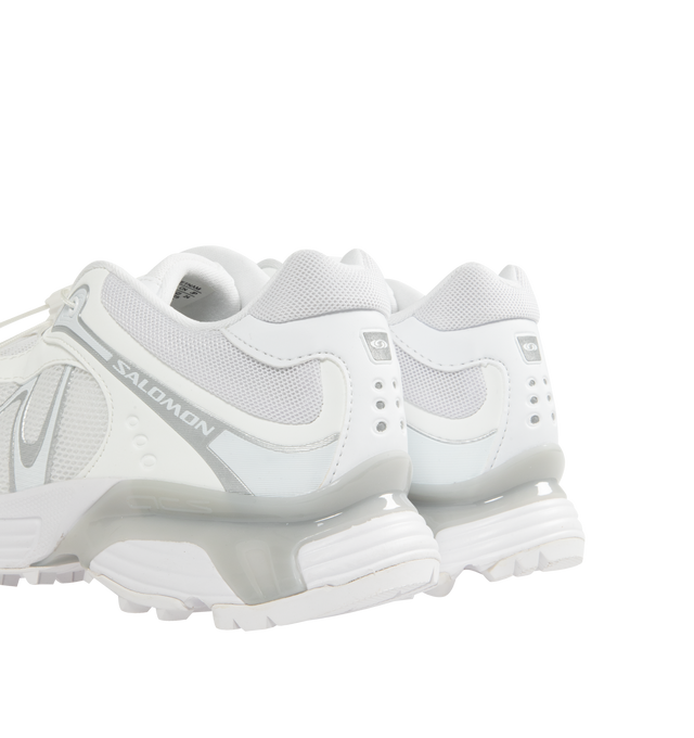 Image 3 of 5 - WHITE - SALOMON XT-Whisper Sneaker featuring chevron lugs, Mud Contagrip, anti-debris mesh, single layer mesh, feather construction, lace pocket, sensiFIT, Molded OrthoLite sockliner, quickLACE and GORE-TEX. 