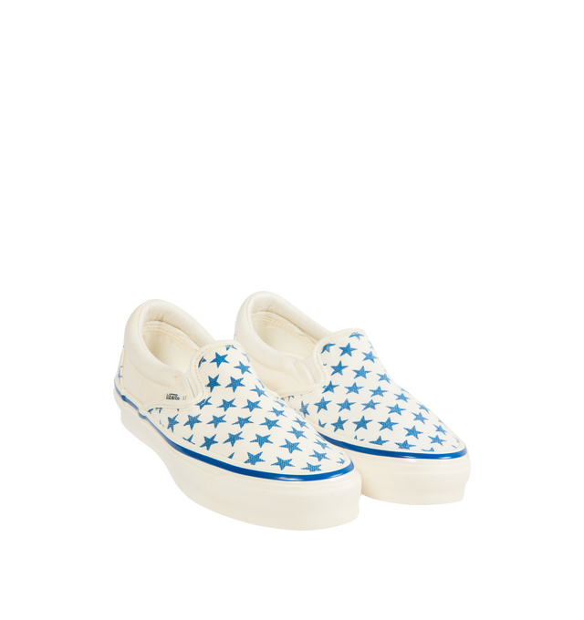 Image 2 of 5 - BLUE - VANS LX Classic Slip On 98 Sneaker featuring padded collar, elastic side panels for easy slip-on and off, higher sidewall with greased finish, foxing tape, Sola Foam ADC insole, signature waffle outsole pattern and vulcanized build.