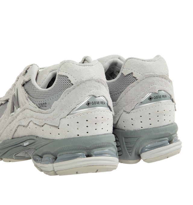 Image 3 of 5 - GREY - NEW BALANCE 2002DX Sneaker featuring soft French terry fabric, ABZORB midsole, ABZORB SBS heel cushioning, N-ergy technology for superior shock absorption, atability Web outsole technology and GORE-TEX waterproof fabric.