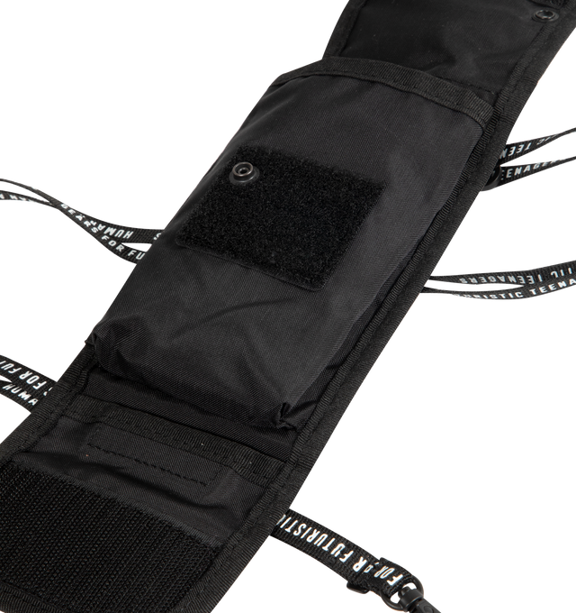 Image 3 of 4 - BLACK - HUMAN MADE Military Pouch featuring shoulder strap, lightweight and durable nylon Oxford fabric, heart-shaped magic tape, removing the tape reveals a text graphic, total of four pockets inside and out, brand logo appears on the shoulder strap and compact size for carrying a smartphone. 100% nylon. 