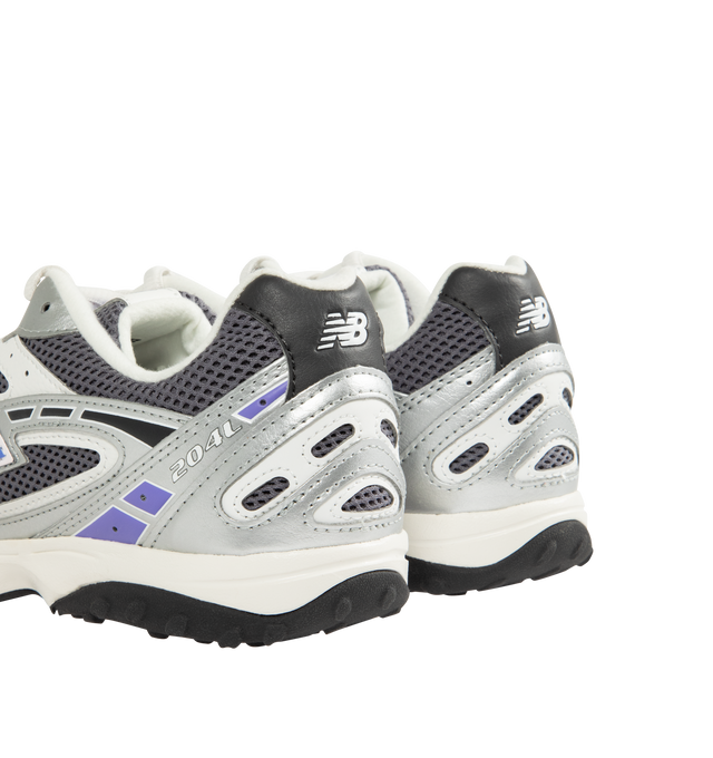 Image 3 of 5 - SILVER - NEW BALANCE 204L Sneaker featuring multi-piece upper with embossed overlay, screen-printed graphics along the saddle, distinctive outsole with 2000s-inspired strike path and 70s-influenced tread pattern and double-stacked suede 'N' logo.
