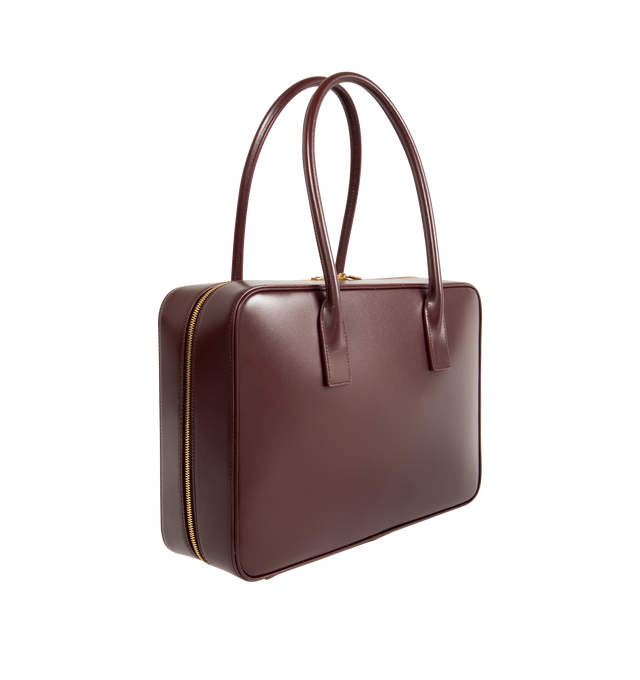 Image 2 of 3 - RED - SAINT LAURENT Sac De Jour Bauletto Bag crafted in smooth leather featuring a wide double-zip opening, long handles, leather lining, bronze-tone hardware, zip closure, one zip pocket and one flat pocket. 13" x 9.3" x 3.9". Calfskin. Made in Italy. 