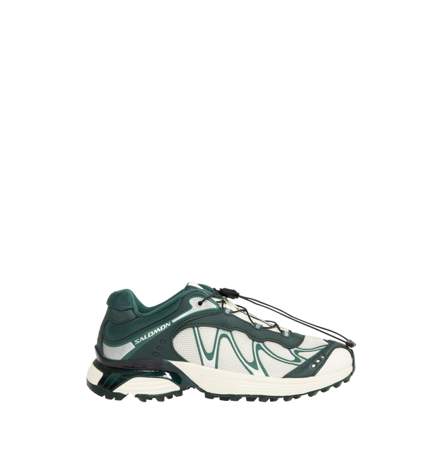 Image 1 of 5 - GREEN - SALOMON XT-Whisper Sneaker featuring textile and synthetic upper, quickLACE, agileChassis System, OrthoLite diecut sockliner, textile lining, anti-debris mesh, chevron lugs and mud contaGRIP.