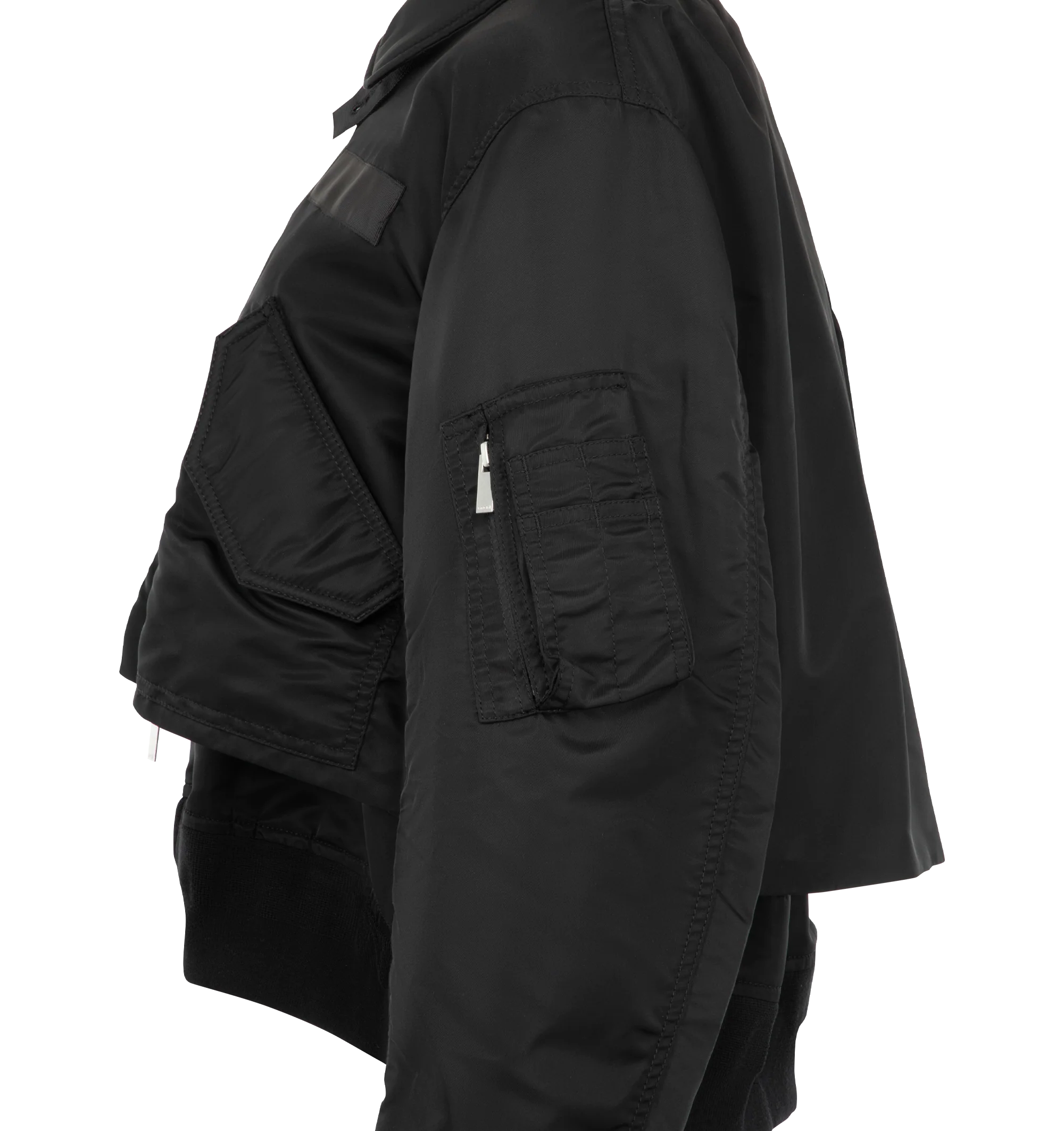 Image 3 of 4 - BLACK - Sacai Nylon Twill Blouson is crafted from nylon twill with lightweight padding. Features a blouson silhouette, mixed-media paneling, full lining, and modern utility-inspired construction. Outer: 100% Nylon; Parts: 55% Polyester, 44% Cotton, 1% Polyurethane; Lining: 100% Polyester; Filling: 100% Polyester. Made in Japan. 