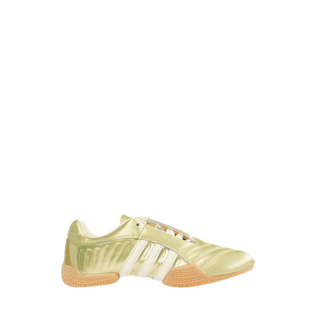 Image 1 of 5 - GOLD - ADIDAS Taekwondo Mei Elite Sneaker featuring regular fit, synthetic and leather upper, textile and leather sockliner, rubber outsole, asymmetric lacing, decorative stitching on the toe and stripes wrapped around the outsole.