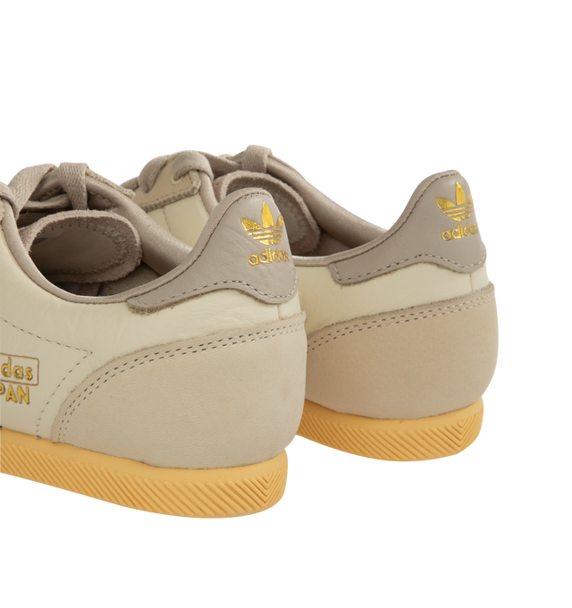 Image 3 of 5 - MULTI - Adidas Japan W Sneakers are a low top, lace-up style with leather uppers, perforations for breathability, double stitching at the toes and heel counters for durability and support, textured EVA midsoles, and signature gold branding.  