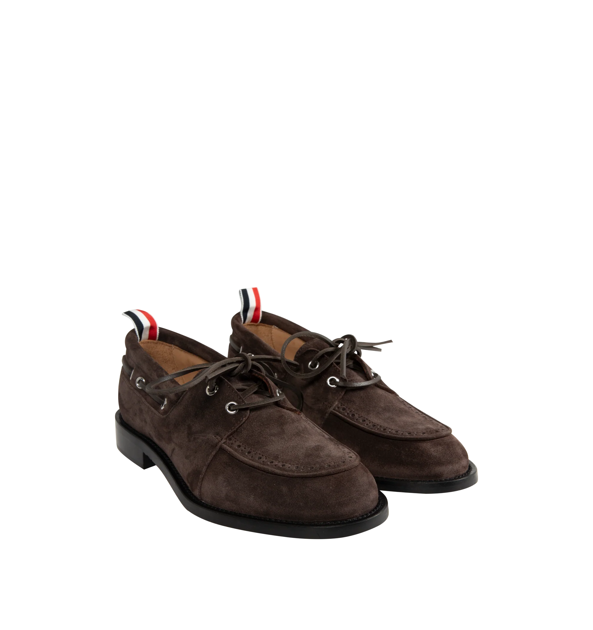 Image 2 of 4 - BROWN - Thom Browne Mens Boat Shoes are crafted from supple calf suede. Feature a lace-up closure, classic boat shoe silhouette, brogue detailing, rubber sole, and signature striped grosgrain loop tab. Main Material: Upper: 100% Calf Suede Leather; Lining: 100% Calf Leather; Sole: 100% Rubber. Made in Italy.