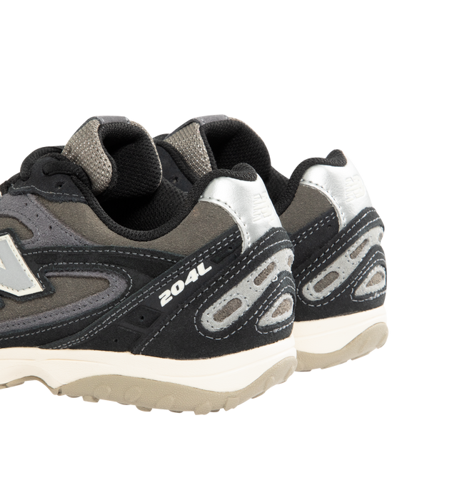 Image 3 of 5 - BLACK - NEW BALANCE 204L Sneaker featuring multi-piece upper with embossed overlay, screen-printed graphics along the saddle, distinctive outsole with 2000s-inspired strike path and 70s-influenced tread pattern, double-stacked suede 'N' logo and lace up closure. Premium suede upper. EVA outsole. 