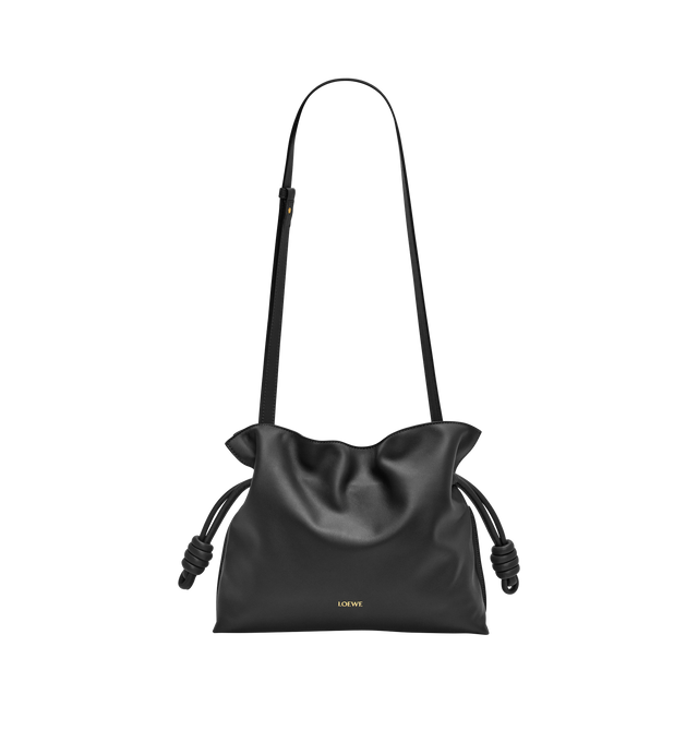 Image 3 of 4 - BLACK - LOEWE Medium Flamenco Clutch in nappa calfskin featuring a soft and slouchy bag with a cinched closure and historical knot drawstrings, shoulder, crossbody or hand carry, detachable and adjustable strap, discreet magnetic closure, suede lining and embossed Anagram. Nappa calf. 24.5 cm x 30 cm x 10.5 cm. Made in Spain.