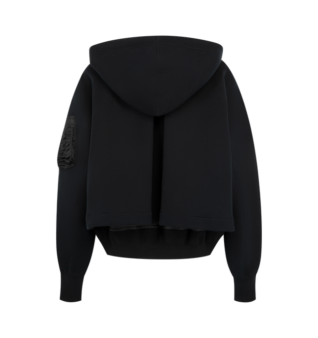 Image 2 of 3 - BLACK - SACAI Sponge Sweat x Nylon Twill Hoodie featuring padded cotton-blend jersey hoodie, drawstring at hood, two-way zip closure, logo-engraved press-stud tab at chest, concealed welt pockets, rib-knit hem and cuffs, cropped hem, utility pocket and pen slots at sleeve, dropped shoulders and nylon satin underlay. 62% cotton, 38% polyester. Lining: 55% polyester, 44% cotton, 1% polyurethane. Fill: 100% polyester. Made in Japan.