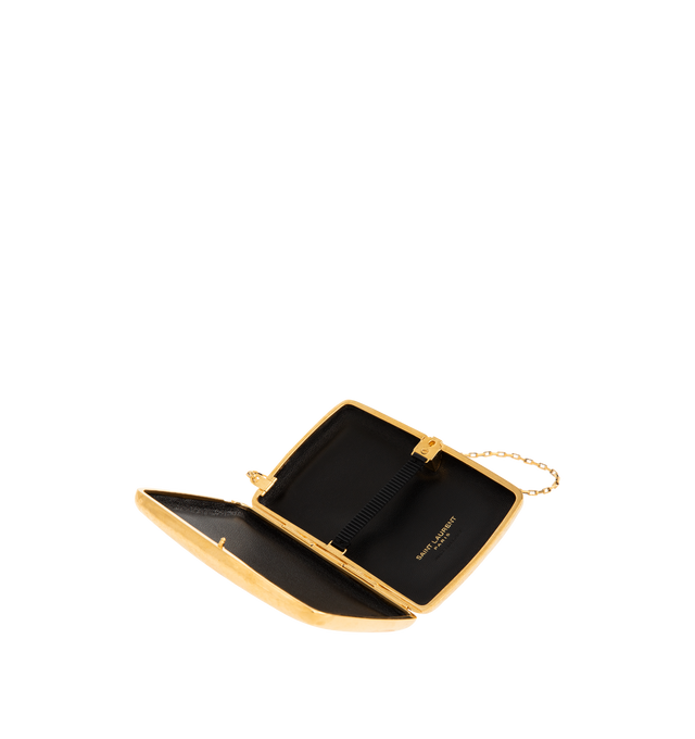 Image 3 of 3 - GOLD - SAINT LAURENT Evening Wristlet in Metal featuring bronze-tone hammered metal, stowable wrist strap, leather lining and kiss-lock closure. Brass. Made in Italy.