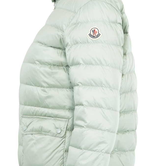 Image 3 of 3 - GREEN - MONCLER Lans Short Down Jacket featuring tech fabric with down fill, standup collar featuring snap buttons, zip-up closure, flap pockets and logo patch at sleeve. 100% polyamide/nylon. Padding: 90% down, 10% feather. Made in Armenia.
