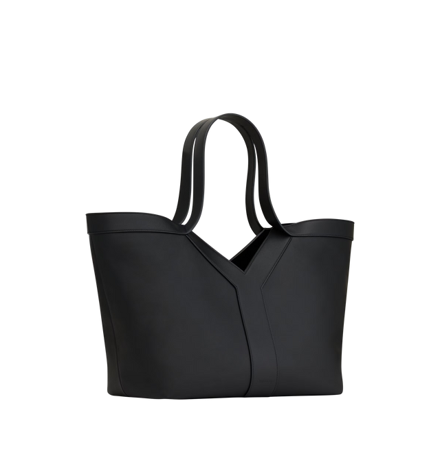 Image 2 of 3 - BLACK - SAINT LAURENT Y Small Tote in leather featuring small version of the Y tote in finely grained leather, ultra-lightweight bag, subtle Y signature stitching, lined in tonal suede, zip pocket, hook closure, one zip pocket and one keyring carabiner tab. 11.4" x 9.4" x 6.5". Calfskin. Made in Italy. 
