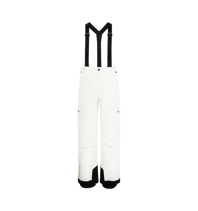 Image 1 of 3 - WHITE - MONCLER GRENOBLE GORE-TEX Laminate Padded Ski Bib featuring 2L GORE-TEX laminate, stretch technical polyester lining, Primaloft Active Insulation, heat-sealed seams, adjustable suspenders, YKK AquaGuard Highly Water Resistant zipper and snap button closure, pockets with YKK AquaGuard Highly Water Resistant and strap closure, powder cuffs, ski cut hem protection, RECCO reflector and silicone logo patch. 100% polyester.