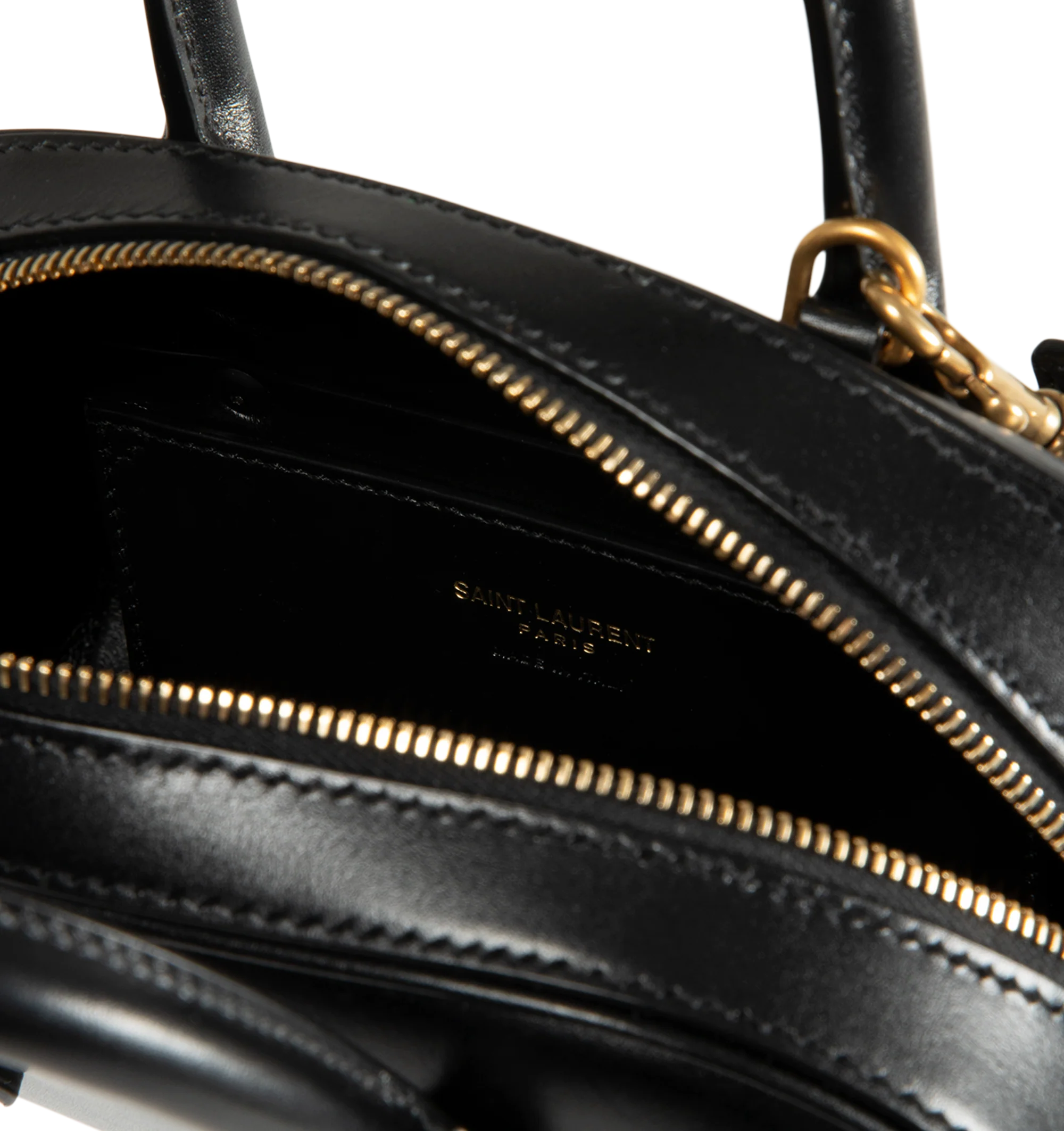 Image 3 of 3 - BLACK - Saint Laurent Womens Sac de Jour Mini Boston Bag is crafted from calfskin leather. Features top handles, adjustable and detachable shoulder strap, zip closure, leather lining, bronze-tone hardware, and two interior card slots. Dimensions: 19 13 7 cm; Handle Drop: 5 cm; Strap Drop: 45 cm. Main Material: Calfskin Leather; Hardware: Brass; Lining: Leather. Made in Italy.