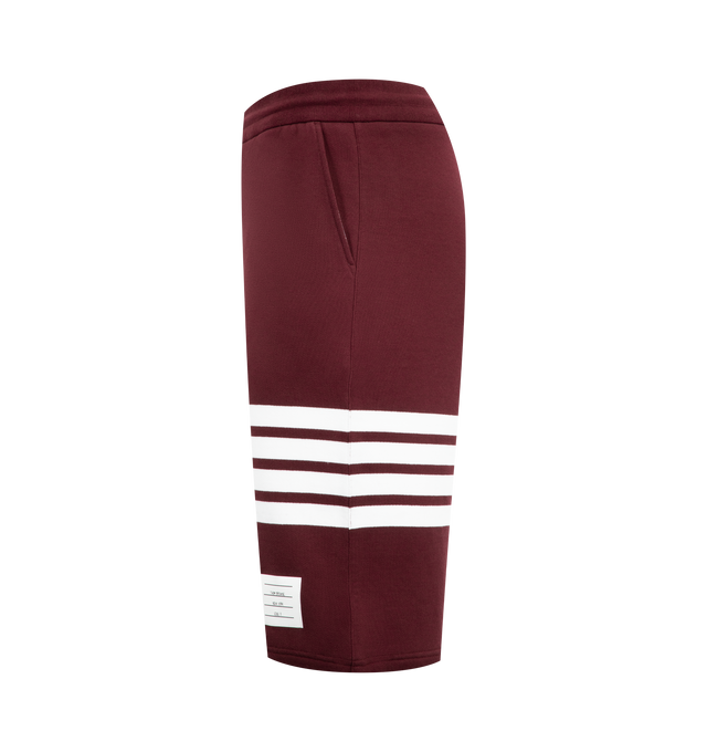 Image 3 of 3 - RED - THOM BROWNE Classic Loopback 4-Bar Sweatshorts featuring drawstring waistband with silver tone aglets, engineered 4-bar stripe detail at left thigh, name tag applique above left cuff, slip side pockets, single back welt pocket and signature striped grosgrain loop tab at back waist. 100% cotton. Made in Japan.