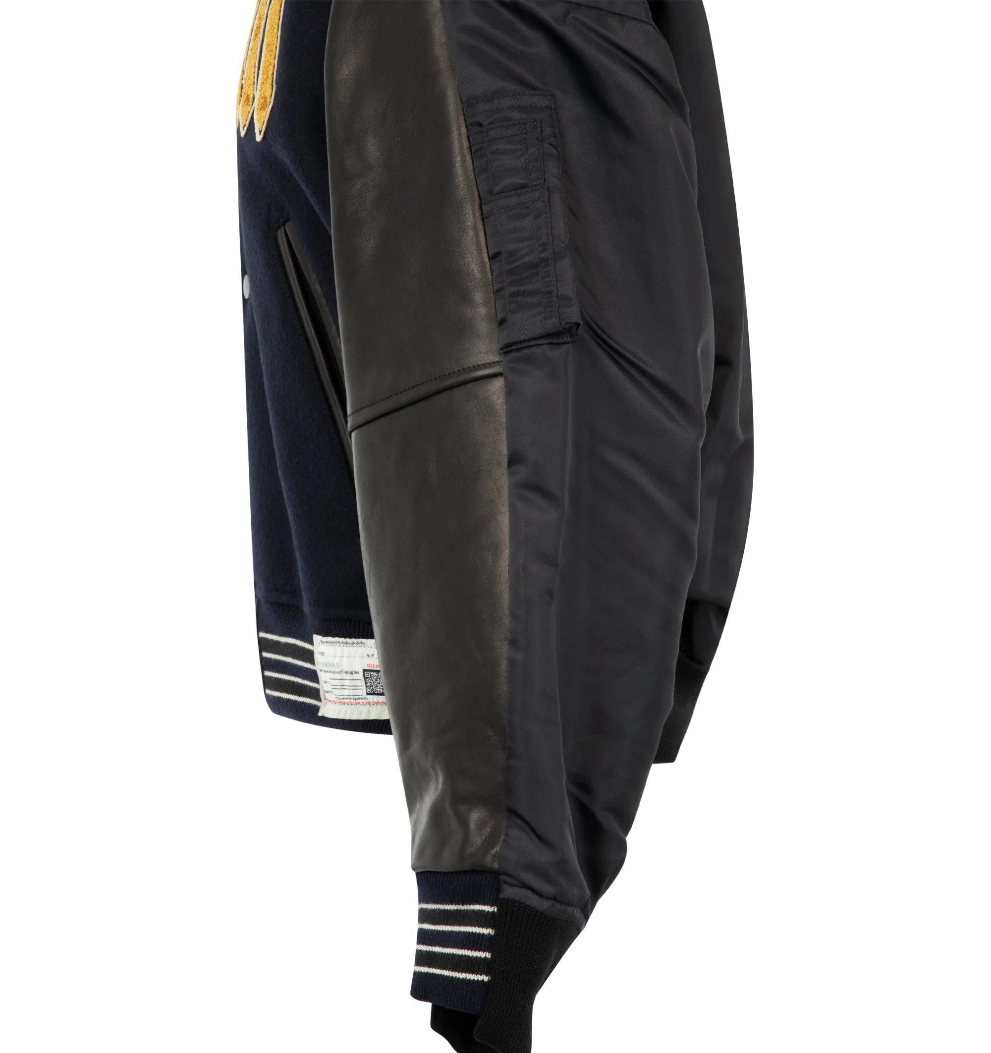 Image 3 of 3 - BLACK - Maison Mihara Yasuhiro Men's Combined Stadium Bomber Jacket is crafted from a premium mixed-material construction and features a hybrid stadium and bomber silhouette with ribbed trim, a front button closure, and side pockets for a contemporary layered look. This designer jacket combines classic varsity-inspired elements with Maison Mihara Yasuhiro's signature deconstructed aesthetic, creating a bold statement piece for everyday wear. Main Material: Mixed Materials. Made in Japan.