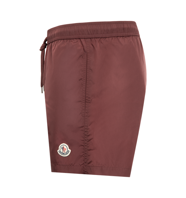 Image 3 of 3 - RED - MONCLER Swim Shorts featuring waistband with drawstring fastening, side pockets, zipped back pocket and silicone logo patch. 100% polyamide/nylon.