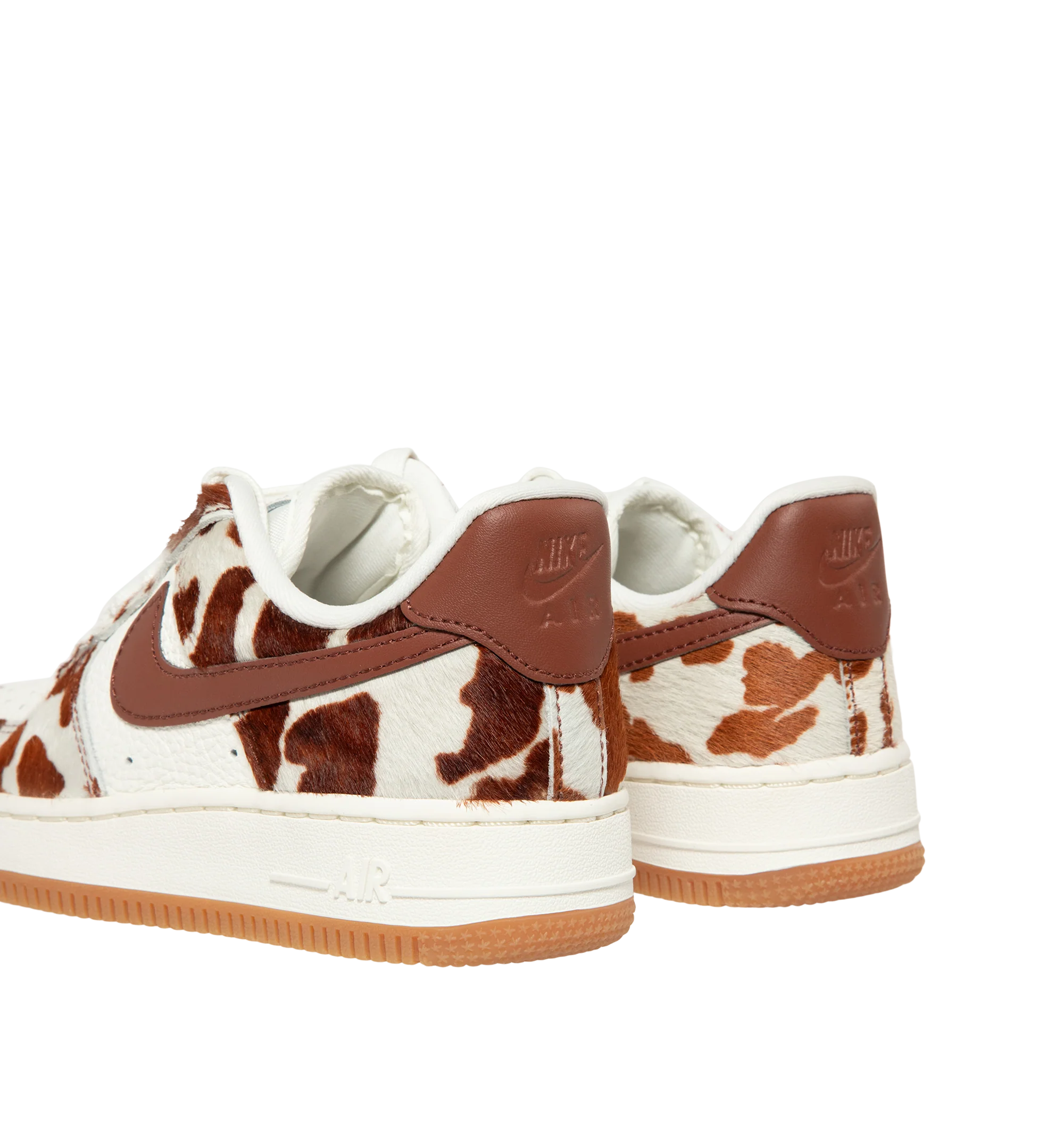 Image 3 of 5 - BROWN - Nike Womens Air Force 1 Sneakers are crafted from pony hair leather with smooth leather overlays. Feature a low-top silhouette, Nike Air cushioning, padded collar, stitched overlays, and a durable rubber cupsole. Main Material: Pony Hair Leather, Leather; Outsole: Rubber. Imported.