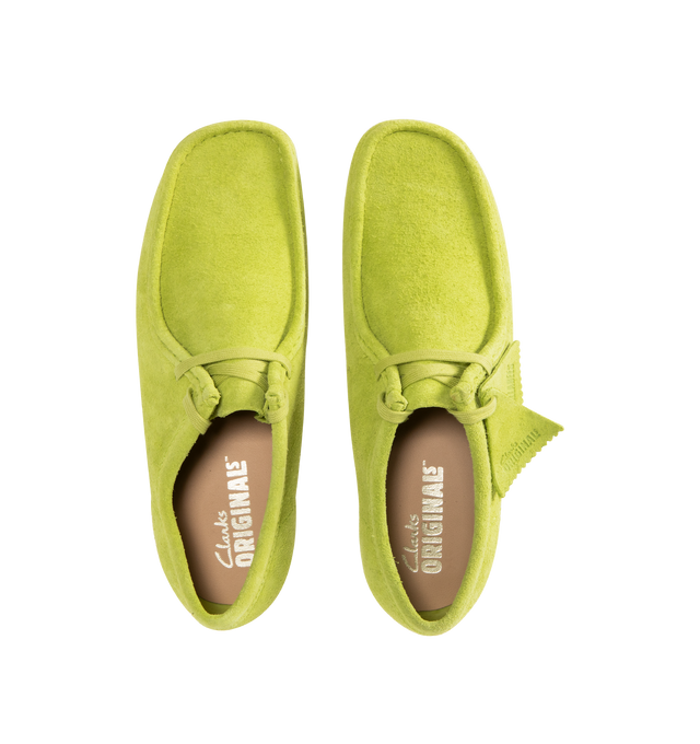 Image 4 of 4 - GREEN - CLARKS Wallabee Shoes featuring suede upper, moccasin construction, hand-stitched apron seams, lace closure, natural pebble crepe sole, branded fobs and embossed branding. 
