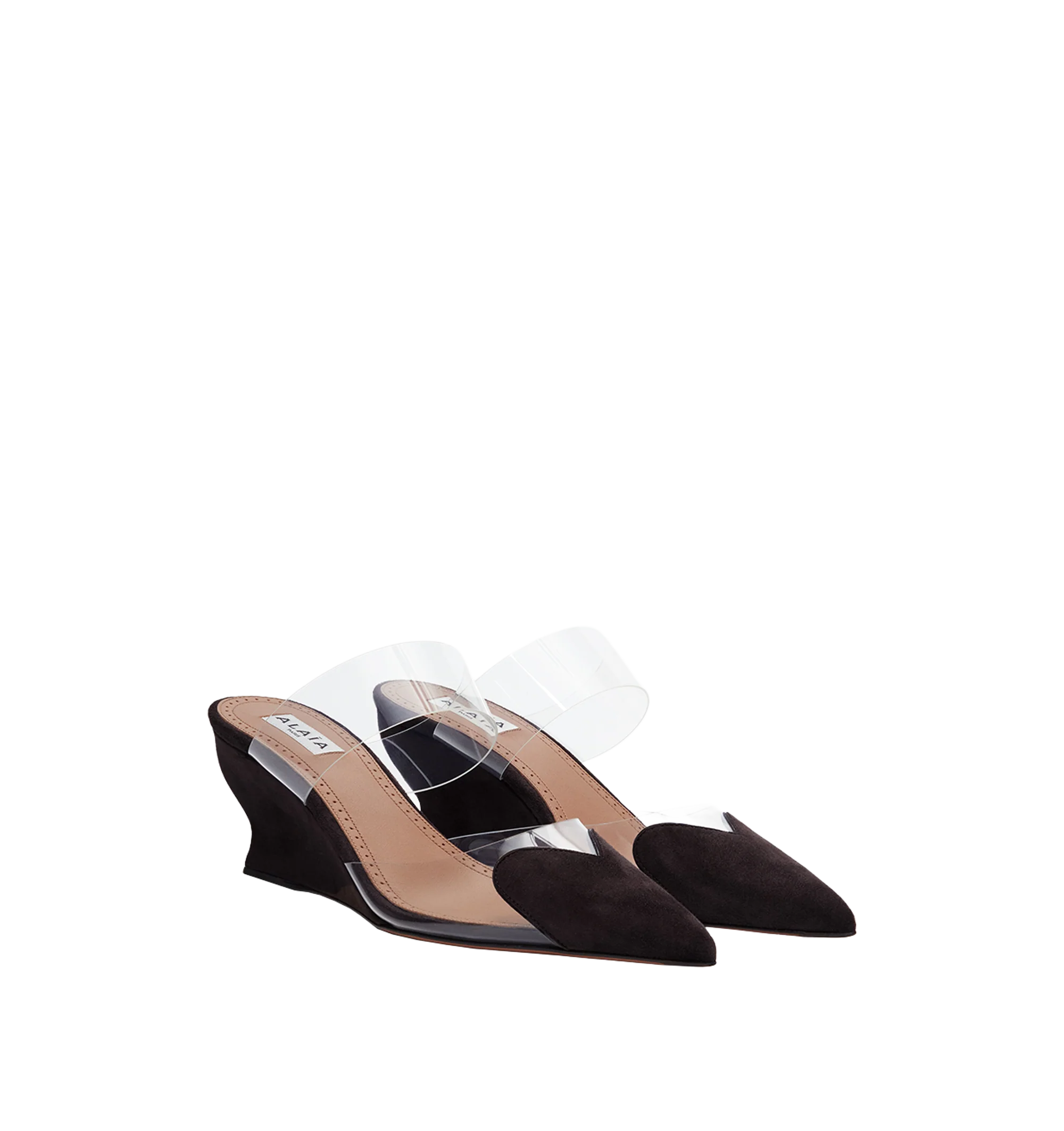 Image 1 of 1 - BROWN - Alaa Womens Heart Cut Wedge Mules are crafted from a luxurious velvet calfskin leather and transparent polyurethane. Features the signature heart cut at the front, 60 mm wedge heel, and slip-on styling. Upper Material 1: Velvet Calfskin Leather, Upper Material 2: 100% Polyurethane. Made in Italy.