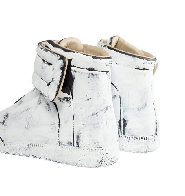Image 3 of 5 - WHITE - MAISON MARGIELA Future Sneaker Bianchetto featuring calfskin, upper and sole are finished with our Bianchetto technique, white paint brushed across the surface to reveal the black leather beneath at the edges, hidden strap folds across the tongue and signature white stitch at the back.