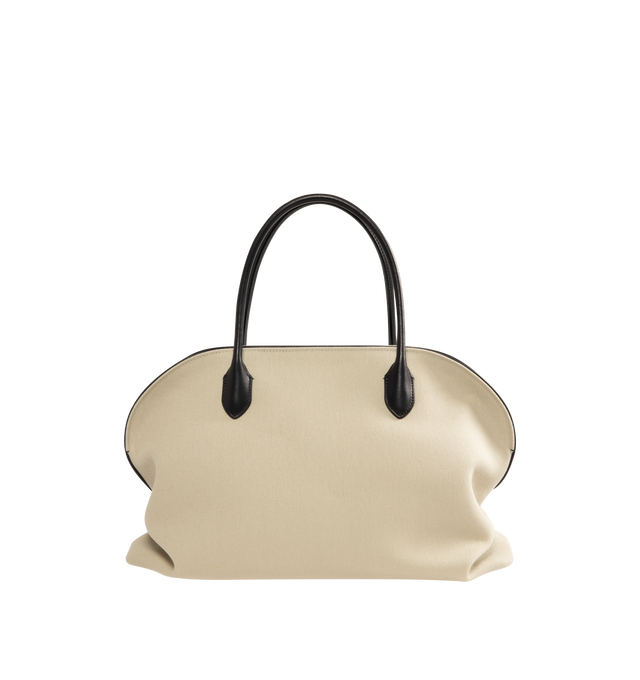 Image 1 of 3 - NEUTRAL - The Row Womens Agnes 15 Canvas Bag is crafted from cotton canvas and cattle leather. Features slim shoulder straps, an open interior with cotton lining, and saddle leather trim. Main Material: Cotton and Cattle Leather; Lining: Cotton. Dimensions: 17.52" W x 9.85" H x 8.66" D; Shoulder Strap Drop: 6.7". Made in Italy.