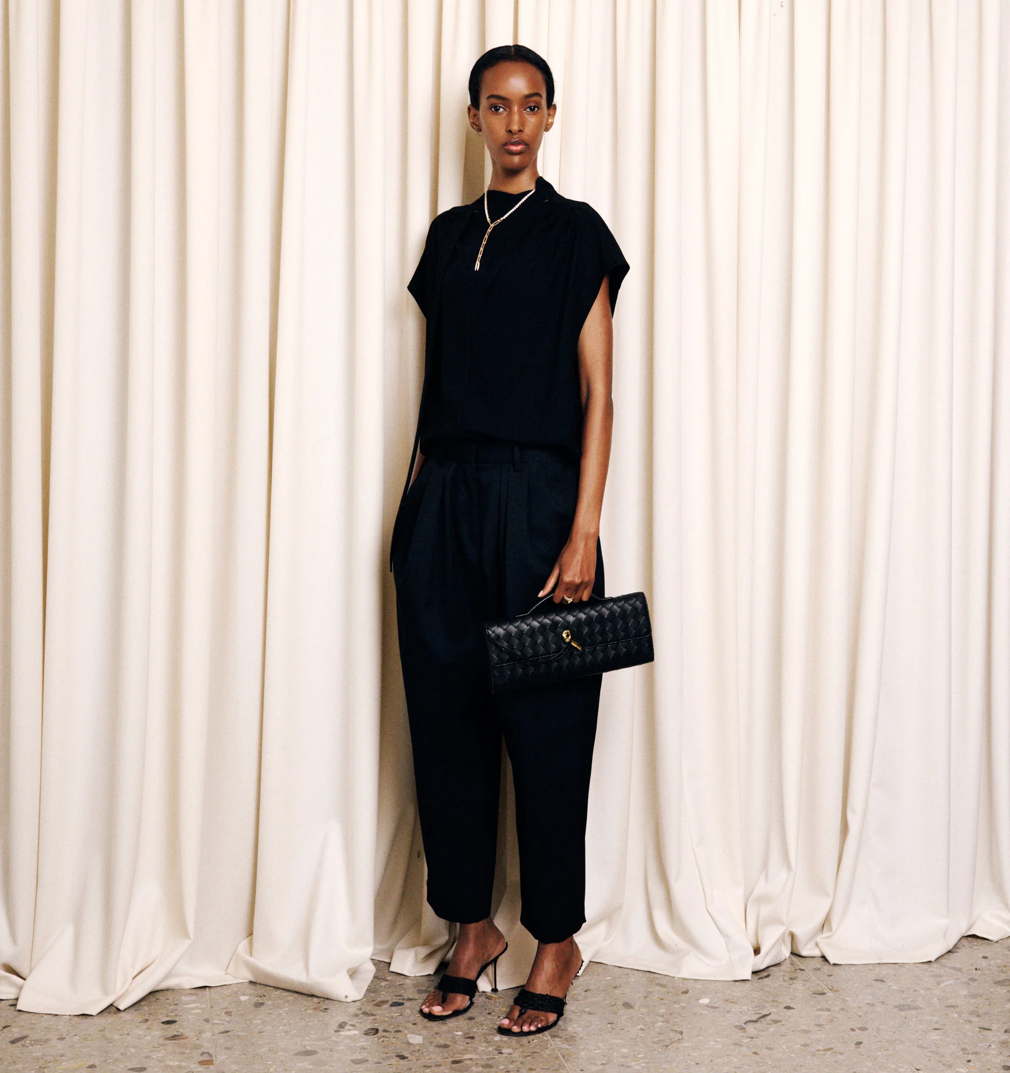Image 3 of 3 - BLACK - Isabel Marant Womens Selene-GB Top is crafted from a textured acetate blend. Features a relaxed silhouette with a stand collar, self-tie neck bow, concealed button-front closure, cap sleeves, and a curved hem. Main Material: 60% Acetate, 40% Polyester. Made in Romania. 