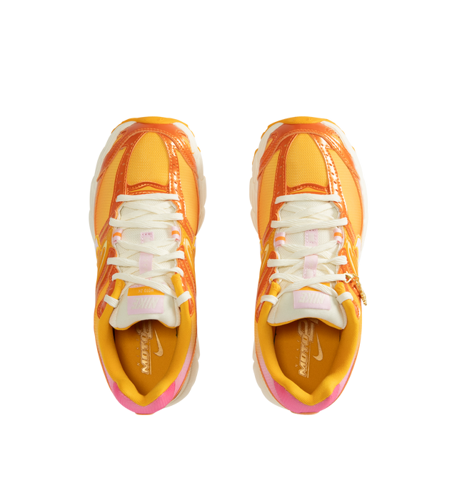 Image 5 of 5 - ORANGE - NIKE Air Max Moto 2K Sneaker featuring metallic accents, Max Air cushioning, upper mixes synthetic leather and textile, foam midsole and rubber outsole.