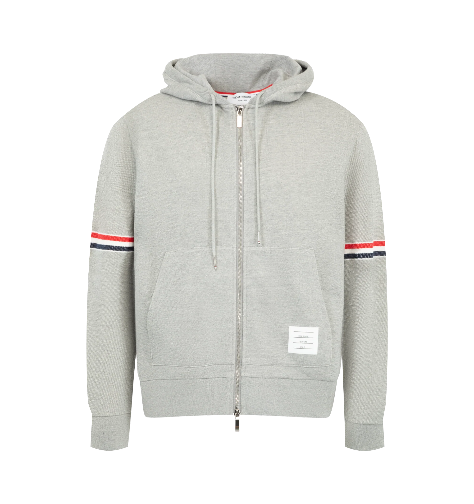 Image 1 of 2 - GREY - Thom Browne Men's Piqu Loopback Zip-Through Hoodie is crafted from cotton and features signature red, white, and blue striped grosgrain armbands. A drawstring hood, two-way front zip closure, side slip pockets, buttoned cuffs with striped grosgrain trim, and a signature grosgrain loop tab complete the design. Main Material: 100% Cotton. Made in Italy.