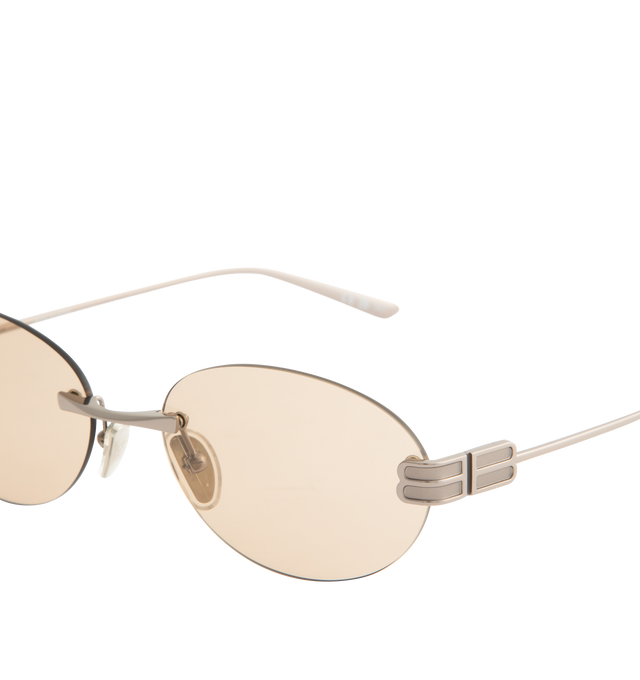 Image 3 of 3 - SILVER - BALENCIAGA Gossip Oval AF Sunglasses featuring full metal temples and rimless frame, oval shape, adjusted fit, hidden hinges within the BB logo and adjustable nose pads with BB logo. 100% UVA/UVB protection. Made in Japan.