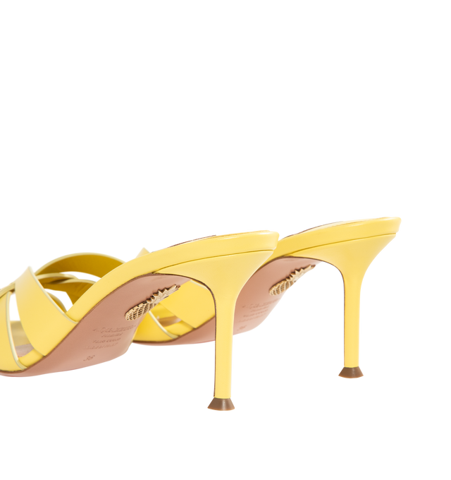 Image 3 of 4 - YELLOW - AQUAZZURA Copacabana Mule 75 featuring cage-like straps, low-cut vamp, slip-on style, mid heel, padded leather insole and signature logo detailing. 75 mm heel. Calf leather. Made in Italy.