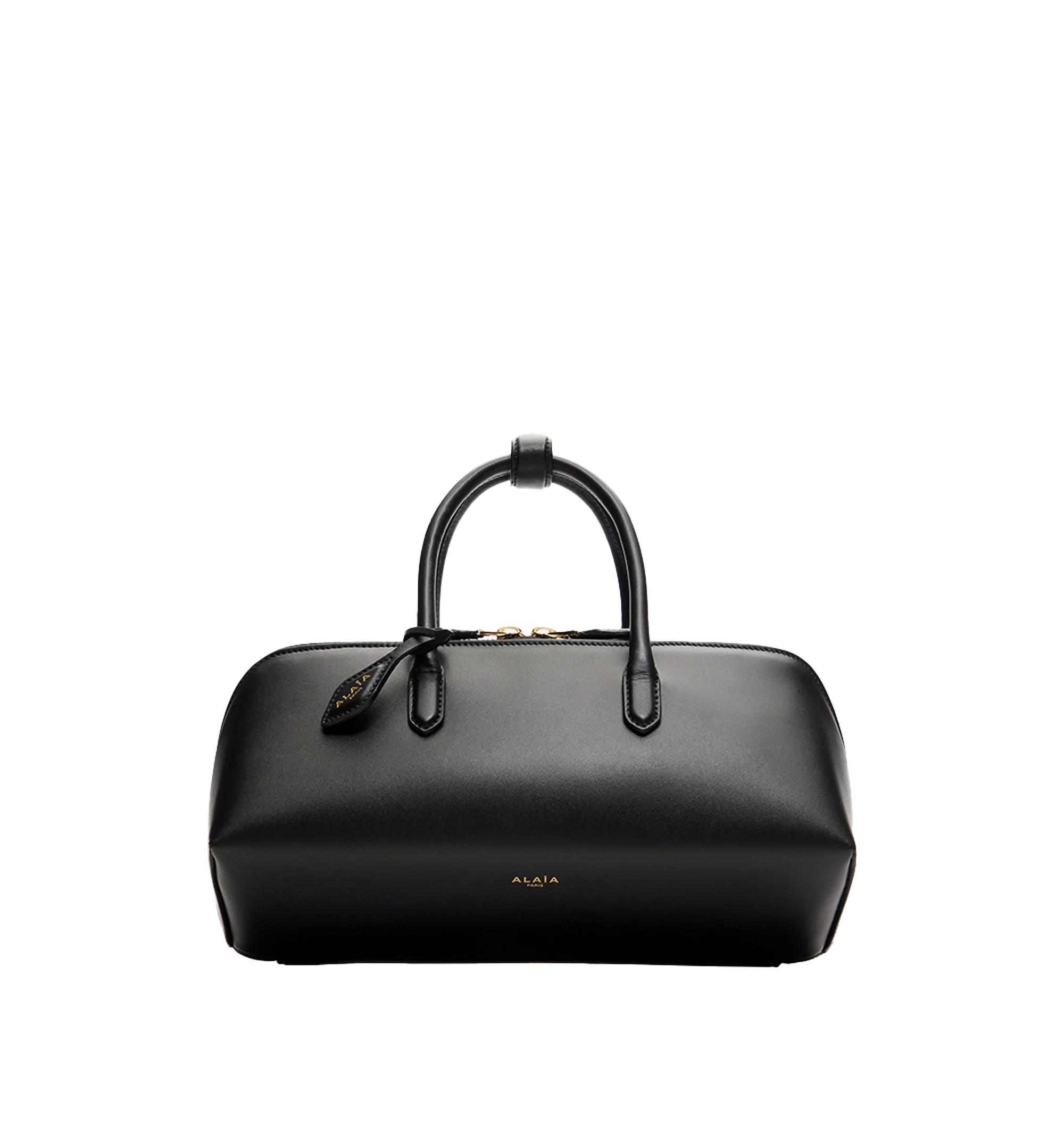 Image 1 of 3 - BLACK - Alaa Women's Delta Small Bag In Box Calfskin features a sculptural sihlouette crafted from soft box calfskin leather and features an elongated silhouette with clean square lines, top handles, a double zip closure, and a front gusset compartment for organized storage. Finished with a decorative branded tie and designed for hand carry. Main Material: 100% Calf Leather. Dimensions: 28 x 11 x 10 cm. Fits a large phone, card case, keys, sunglasses and other small essentials. Made in Italy.