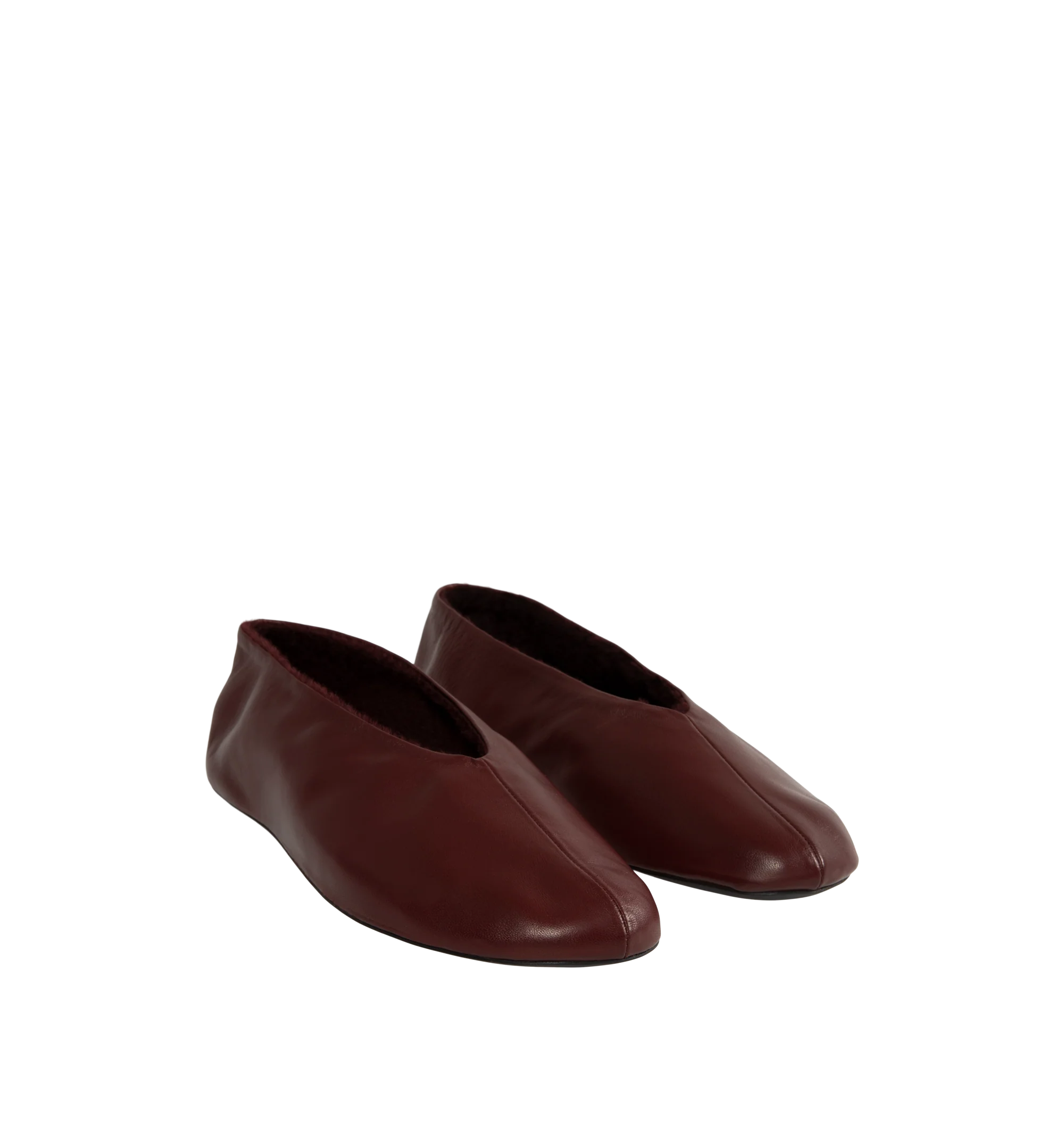 Image 2 of 4 - RED - The Row Women's Stella Slippers are crafted from smooth nappa lambskin leather and feature a slip-on silhouette with an oval toe, soft shearling lining, and a flexible rubber-coated sole. These designer leather slippers combine exceptional Italian craftsmanship with luxurious comfort, making them an elevated choice for effortless everyday wear. Main Material: 100% Lambskin Leather. Lining: Shearling. Sole: Rubber-Coated. Made in Italy.