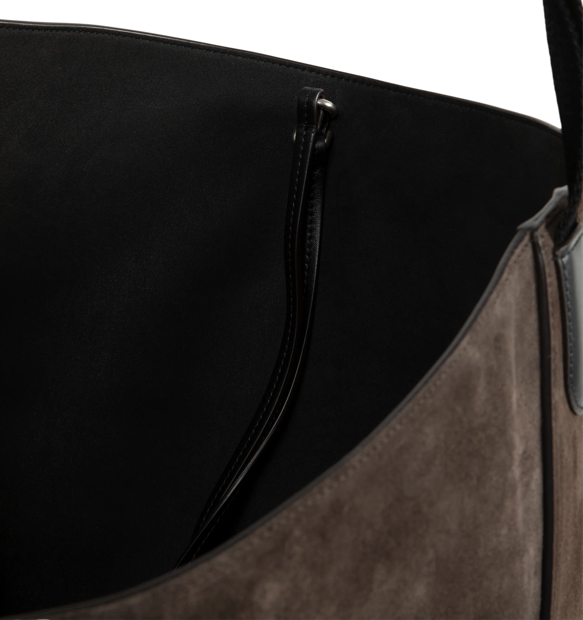 Image 3 of 3 - BROWN - Moncler Women's Carlo Suede Shoulder Bag is crafted from tactile cow suede and features a soft hobo silhouette accented with leather piping and contrast blanket stitching. Designed for versatile hand or shoulder carry, this designer bag features a leather handle, nylon lining, a removable zipped pouch, and signature Moncler logo detailing at the bottom. Leather Exterior: Cow Leather. Leather Inserts: Cow Leather. Lining: 100% Polyamide/Nylon. Dimensions: 28 x 31 x 18 cm. Fits a large  