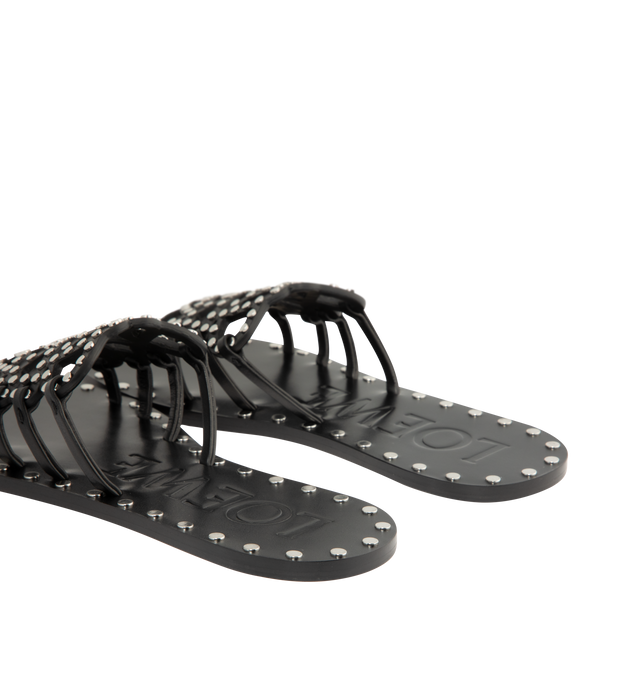 Image 3 of 4 - BLACK - LOEWE PAULA'S IBIZA Petal Anagram Slide in vegetable-tanned calfskin and metallic studs featuring a cut-out Anagram upper with hand-stitched seams, a petal toe shape and studs with a silver finish. 5mm heel. Vegetable calfskin. Made in Italy.